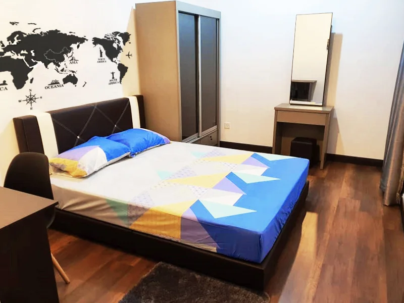 Bedroom features: queen-size bed with patterned bedding, upholstered headboard, wooden flooring, built-in wardrobe with sliding doors, mirror on dressing table, study desk, black chair, decorative wall map, curtains, area rug; style: modern.